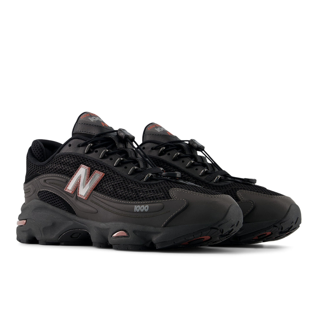 NEW BALANCE U100010A BLACK METALLIC/RED ROCK