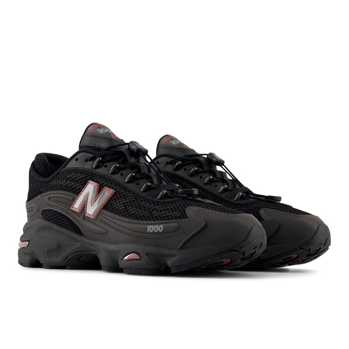 NEW BALANCE U100010A BLACK METALLIC/RED ROCK